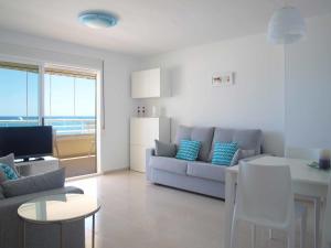 Ein Sitzbereich in der Unterkunft ApartUP Spectacular Beach View