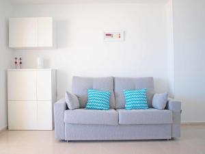 Ein Sitzbereich in der Unterkunft ApartUP Spectacular Beach View