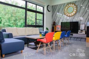 TV a/nebo společenská místnost v ubytování Chikubi Homestay