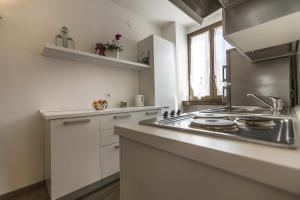 Nhà bếp/bếp nhỏ tại Le Servite Apartments