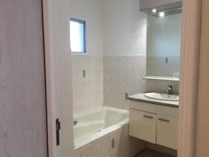 Koupelna v ubytování Sun Villa chambre chez l habitant + 14 fotografií