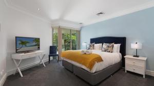 Voodi või voodid majutusasutuse Unit 39 - 3 Bed Garden View toas