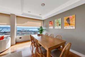 a dining room with a table and chairs at Amazing Bosphorus View Apartment in Istanbul
