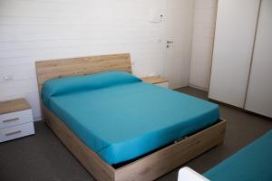 Ліжко або ліжка в номері AURORA BEACH & SUITE