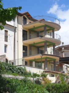 a building with balconies on the side of it at Giamia Villas in Sulmona