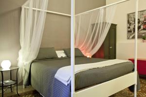 Łóżko lub łóżka w pokoju w obiekcie Happy Stay Guesthouse