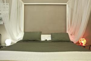 Łóżko lub łóżka w pokoju w obiekcie Happy Stay Guesthouse