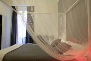 Łóżko lub łóżka w pokoju w obiekcie Happy Stay Guesthouse