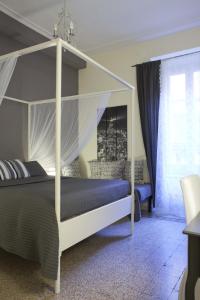 Łóżko lub łóżka w pokoju w obiekcie Happy Stay Guesthouse