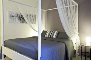 Łóżko lub łóżka w pokoju w obiekcie Happy Stay Guesthouse