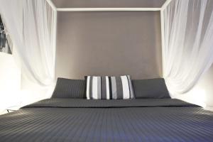 Łóżko lub łóżka w pokoju w obiekcie Happy Stay Guesthouse