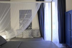 Łóżko lub łóżka w pokoju w obiekcie Happy Stay Guesthouse
