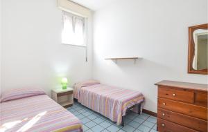 A bed or beds in a room at Gorgeous Home In Pozzallo