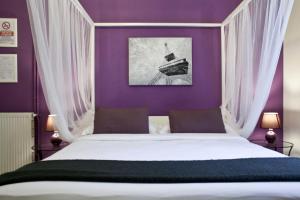 Łóżko lub łóżka w pokoju w obiekcie Happy Stay Guesthouse