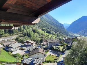 a view of a village in the mountains at Chez Ferdinand in Valtournenche