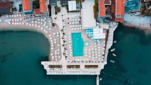 an aerial view of a marina with boats in the water at Palmon Bay Hotel & Spa in Herceg-Novi