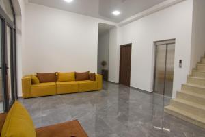 Posezení v ubytování Lileo Inn Hotel