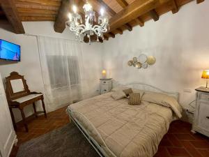 Ένα ή περισσότερα κρεβάτια σε δωμάτιο στο Villa Borgo Soale +99 φωτογραφίες