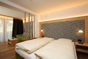Voodi või voodid majutusasutuse Residence Garni Stella toas