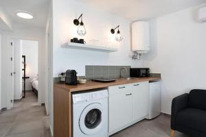 Kuchyň nebo kuchyňský kout v ubytování Apartamentos Vexèr
