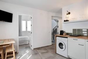 Kuchyň nebo kuchyňský kout v ubytování Apartamentos Vexèr