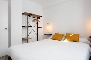 Postel nebo postele na pokoji v ubytování Apartamentos Vexèr
