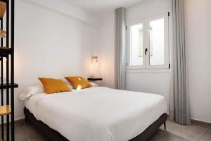 Postel nebo postele na pokoji v ubytování Apartamentos Vexèr
