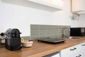 Kuchyň nebo kuchyňský kout v ubytování Apartamentos Vexèr