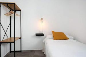 Postel nebo postele na pokoji v ubytování Apartamentos Vexèr