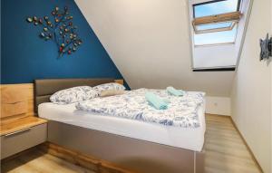 Postel nebo postele na pokoji v ubytování Ferienhaus In Rechnitz + 4 fotografie