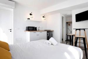 Postel nebo postele na pokoji v ubytování Apartamentos Vexèr