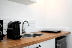 Kuchyň nebo kuchyňský kout v ubytování Apartamentos Vexèr