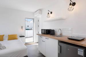 Kuchyň nebo kuchyňský kout v ubytování Apartamentos Vexèr