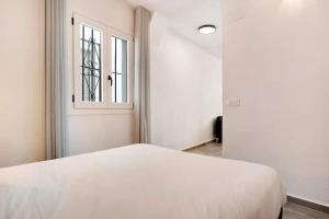 Postel nebo postele na pokoji v ubytování Apartamentos Vexèr
