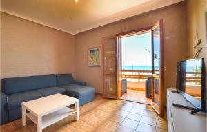 A television and/or entertainment centre at Amazing Apartment In Marina Di Ragusa