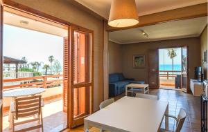 A balcony or terrace at Amazing Apartment In Marina Di Ragusa