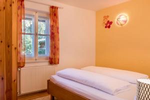Postel nebo postele na pokoji v ubytování Ferienhaus Fingerhut
