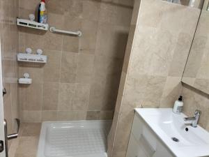 Łazienka w obiekcie Delfin Home