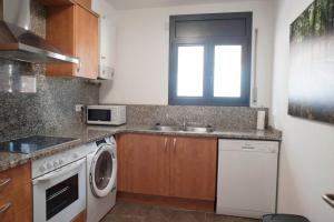 Kuchyňa alebo kuchynka v ubytovaní Apartament Bisaura de Ter