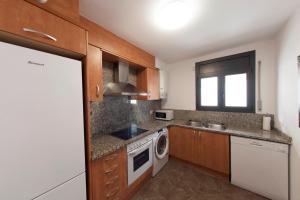 Kuchyňa alebo kuchynka v ubytovaní Apartament Bisaura de Ter