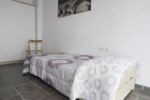 Posteľ alebo postele v izbe v ubytovaní Apartament Bisaura de Ter