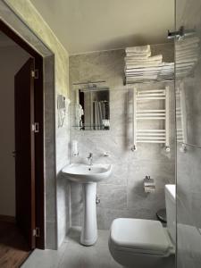Koupelna v ubytování Lileo Inn Hotel