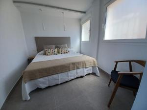 Postel nebo postele na pokoji v ubytování Los Balcones