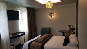 Posteľ alebo postele v izbe v ubytovaní Hôtel d'Angleterre Rouen Centre Gare