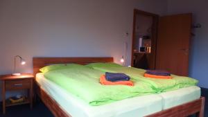 Giường trong phòng chung tại Haus Masonblick