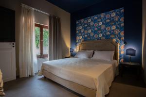A bed or beds in a room at Citrus, between Etna and the Sea Még 37 kép