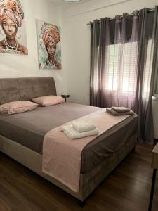 Postel nebo postele na pokoji v ubytování Sea View Residence by MD