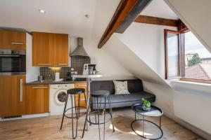 Η κουζίνα ή μικρή κουζίνα στο Duplex Vue Montagne - ideally located with its view