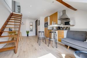 Η κουζίνα ή μικρή κουζίνα στο Duplex Vue Montagne - ideally located with its view