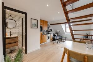 Η κουζίνα ή μικρή κουζίνα στο Duplex Vue Montagne - ideally located with its view